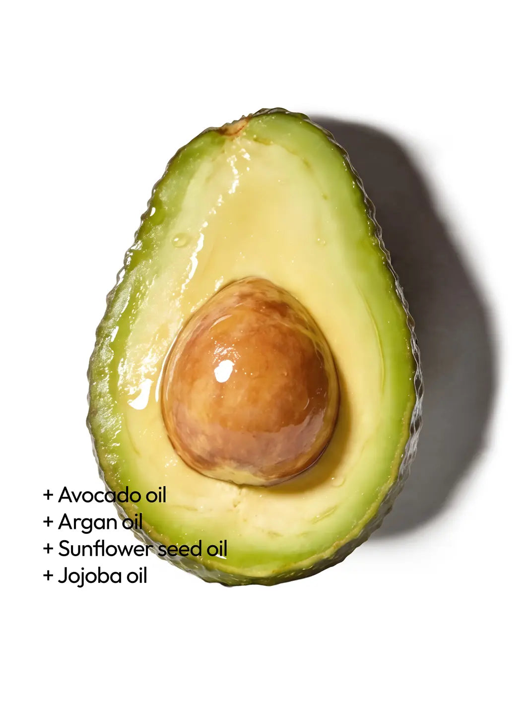 Top view of avocado, argan, sunflower seed and jojoba oils with a smooth, glossy texture, illustrating nourishing cleansing ingredients used in Yelf Clean Affairs Cleansing Milk