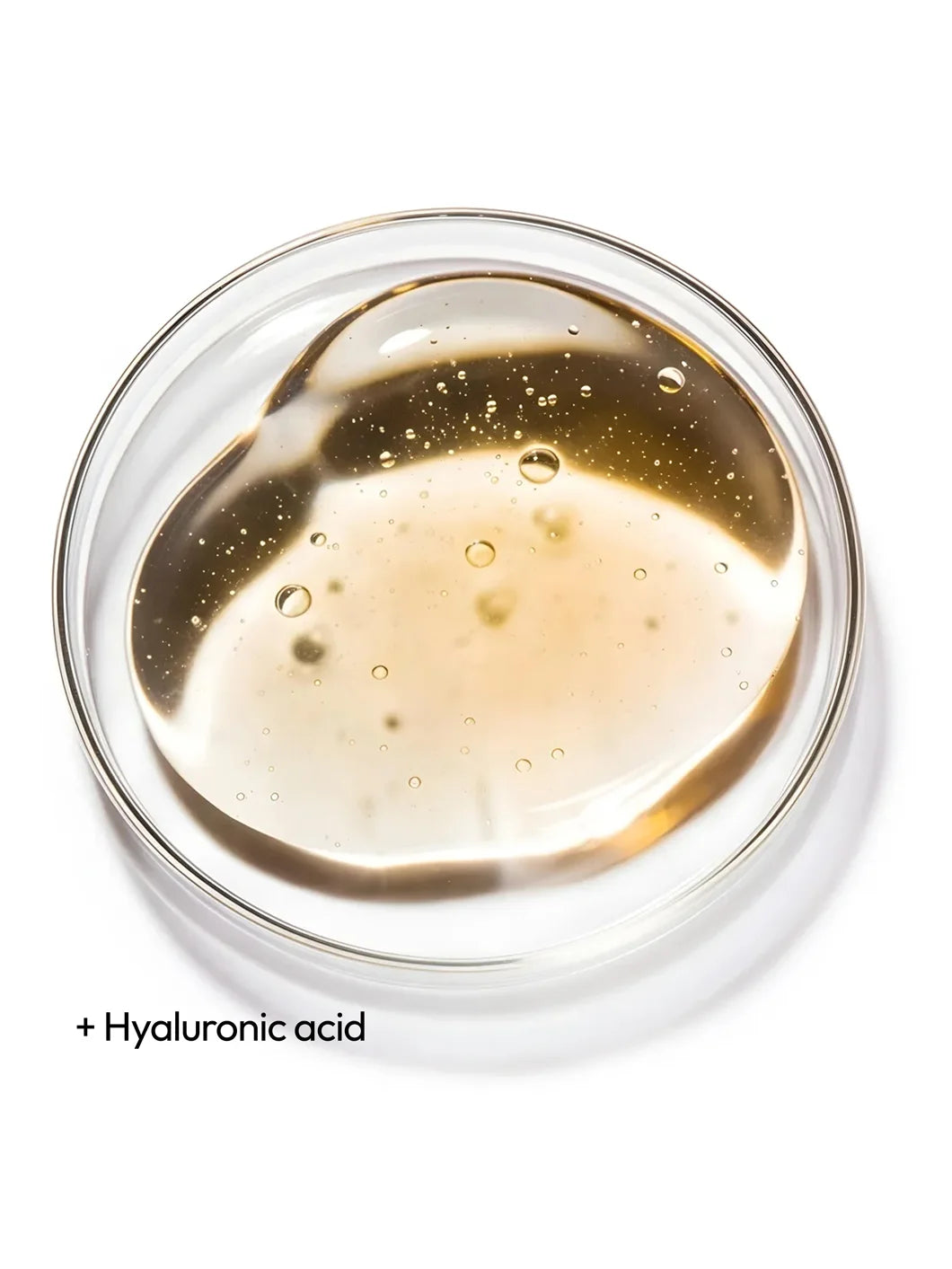 Top view of hyaluronic acid in a clear gel texture within a petri dish, illustrating intense hydration in Yelf Viva el Boost Hyaluron Cream