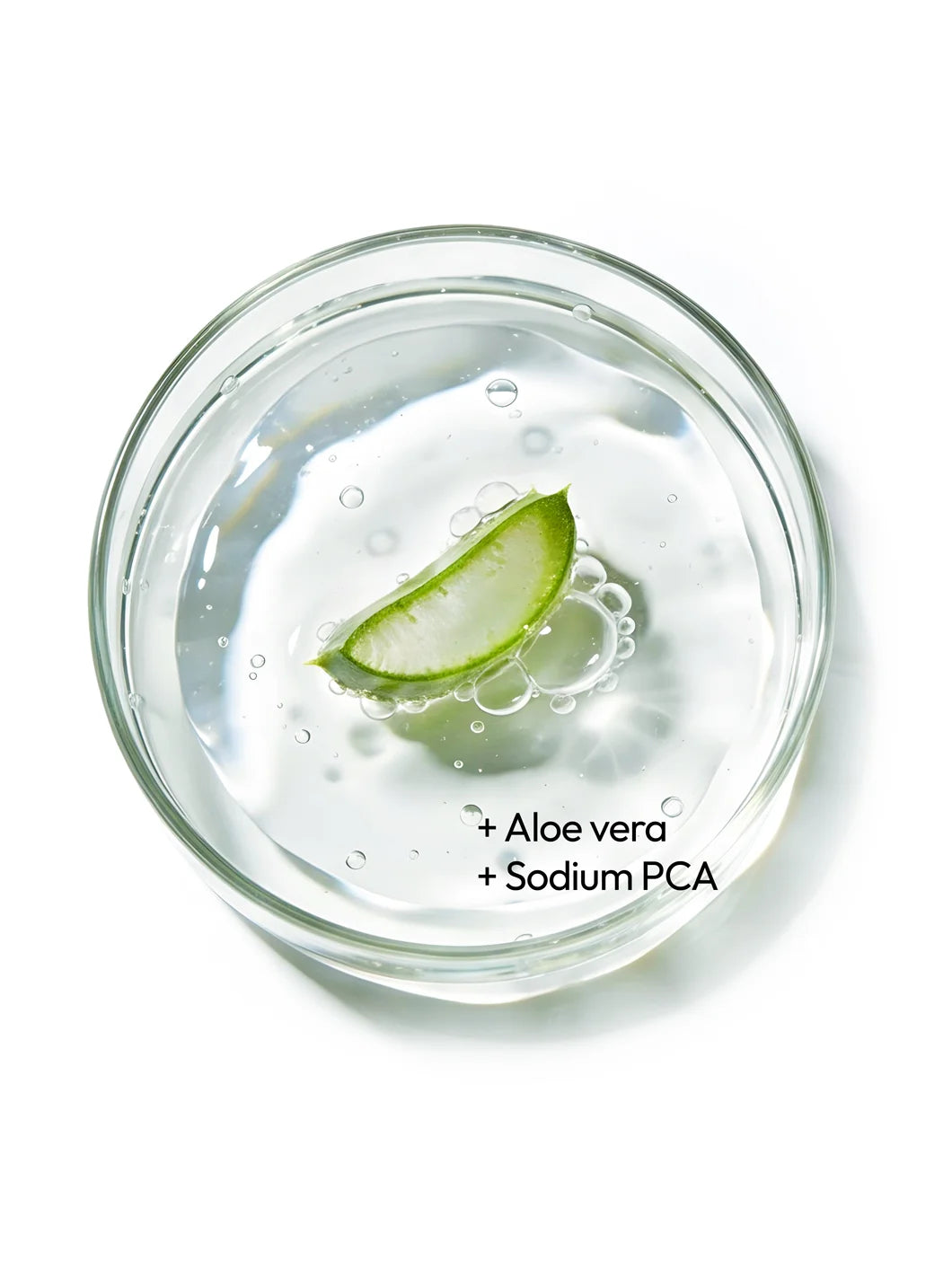 Top view of aloe vera and sodium PCA in a clear hydrating gel with air bubbles inside a petri dish, representing soothing moisture in Yelf Viva el Boost Hyaluron Gel